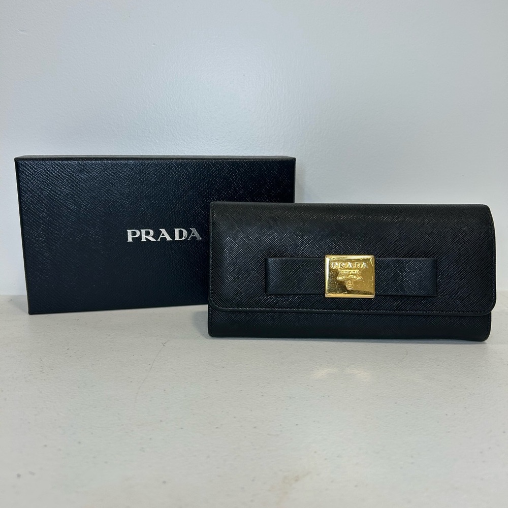 Prada Long Wallet Bi fold Black Leather with ribbon.